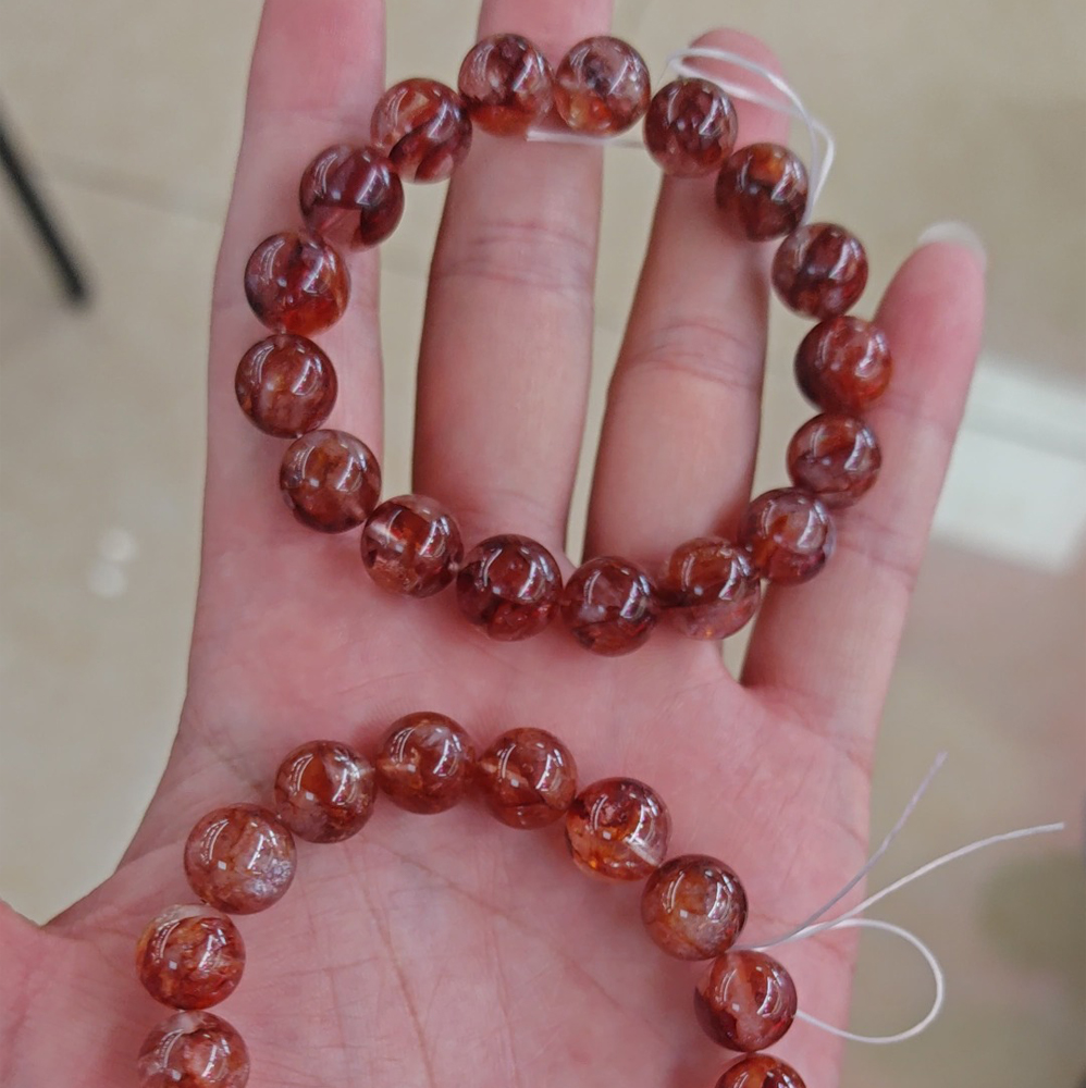 Oxblood red phantom quartz (with hematite inclusions)
