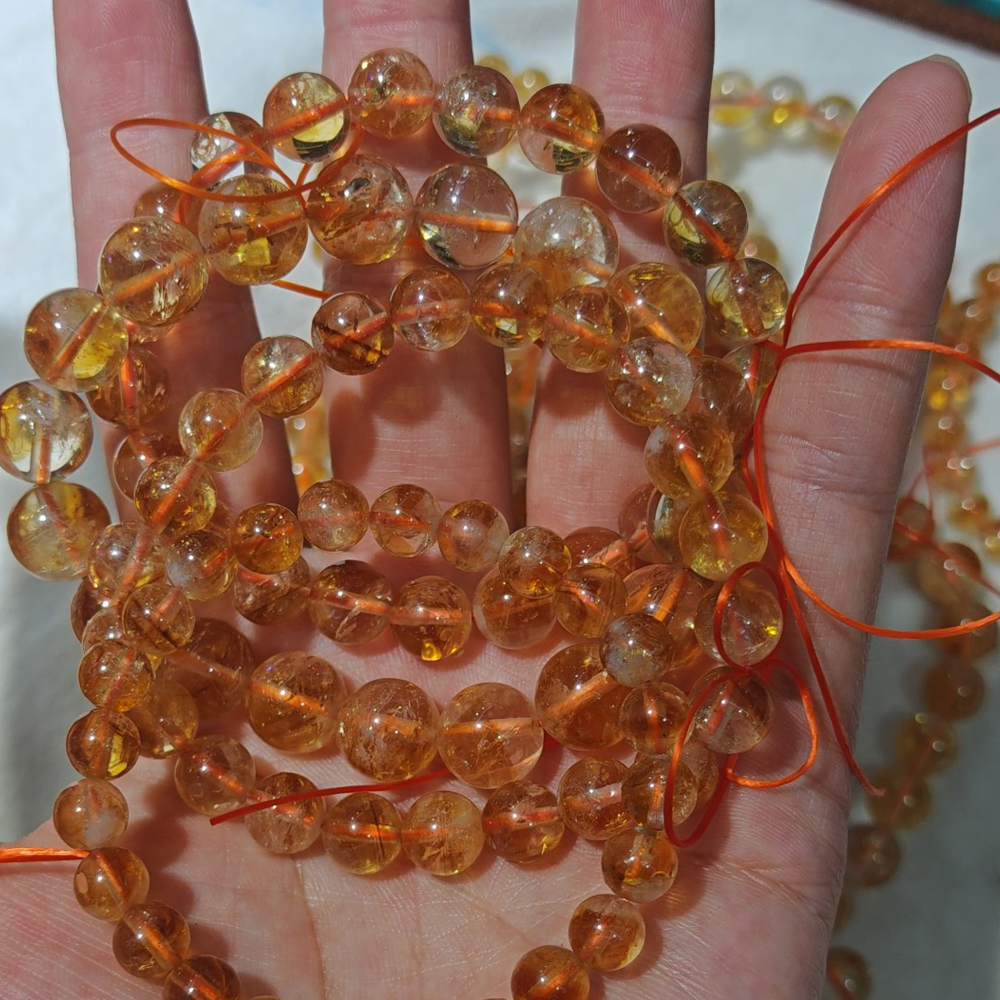 Clear-bodied yellow phantom quartz tower beads