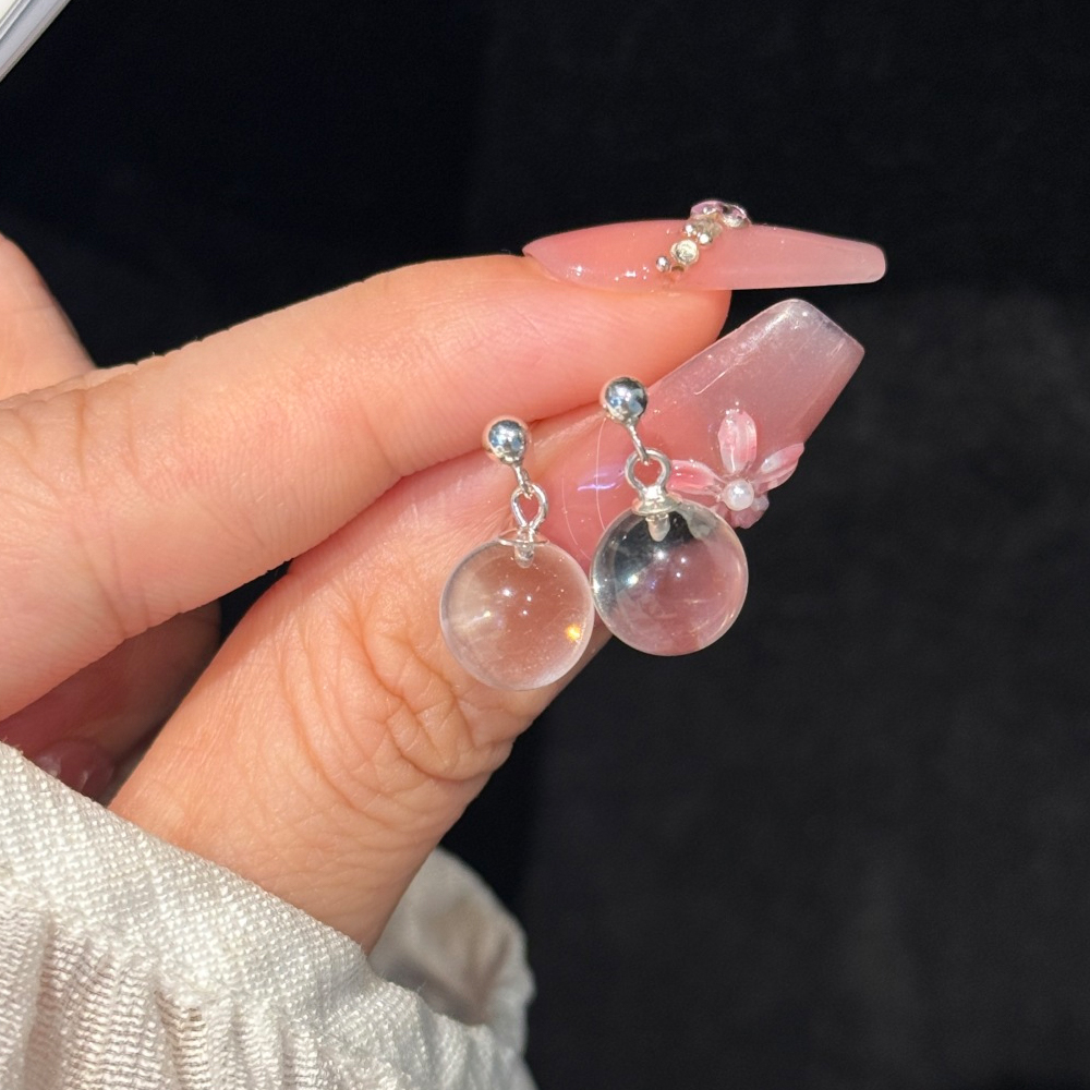 "Clear Quartz Studs: Tiny, Translucent 'Lightbulbs'
